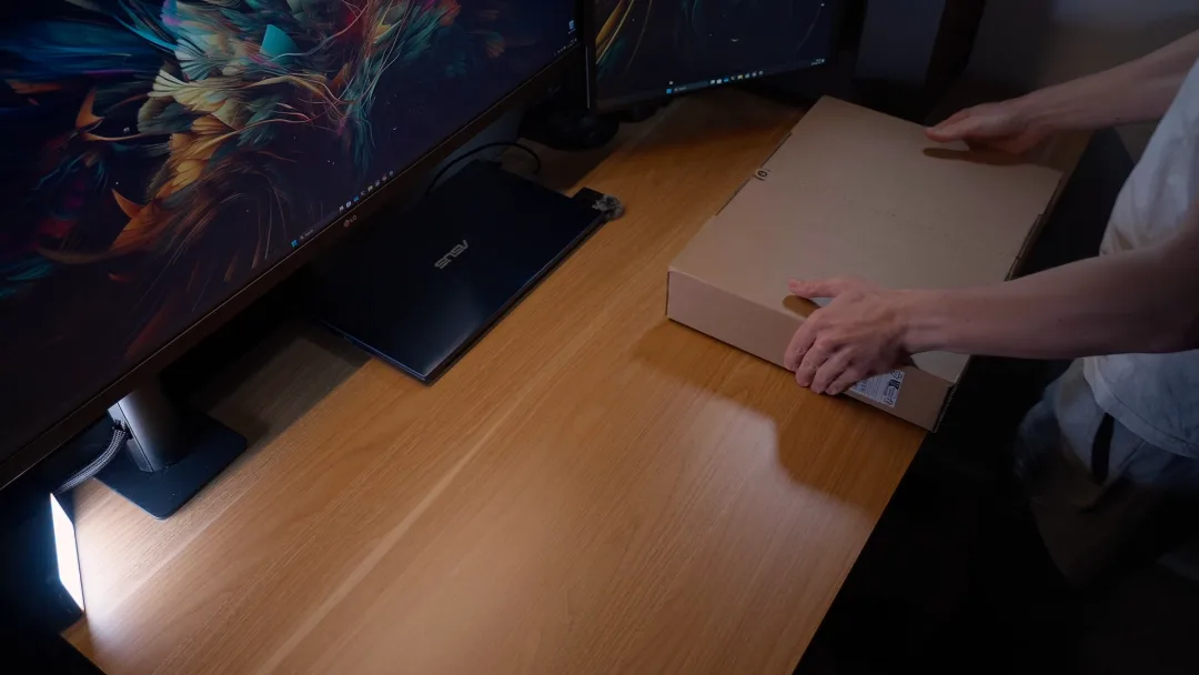 A product parcel being opened on a desk